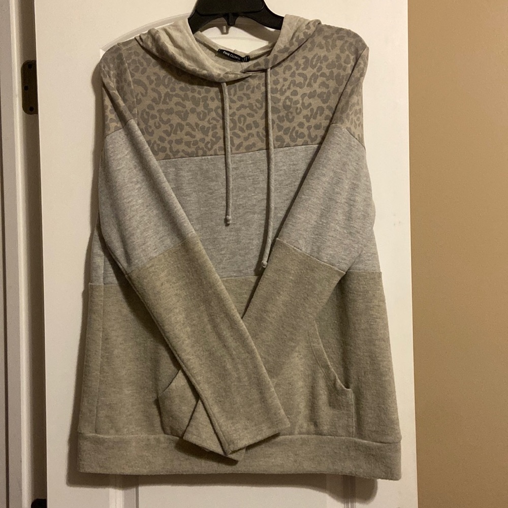 not my style, very soft, 68% polyester, fits a tiny bit small